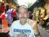 photo of Bill eating gyros at an outdoor cafe in Rhodes Greece.