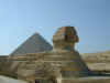 picture of the sphinx with a pyramid in the background